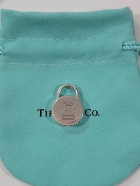 Tiffany & Co. Sterling Padlock Charm.